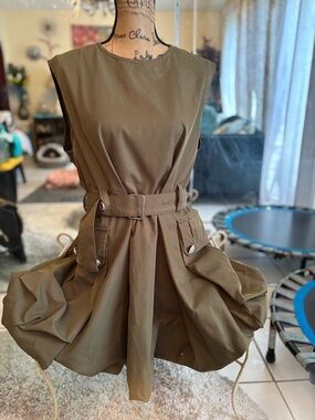 Olive Sleeveless Belted Mini Dress with Pocket Detail .. there is a little spot.
